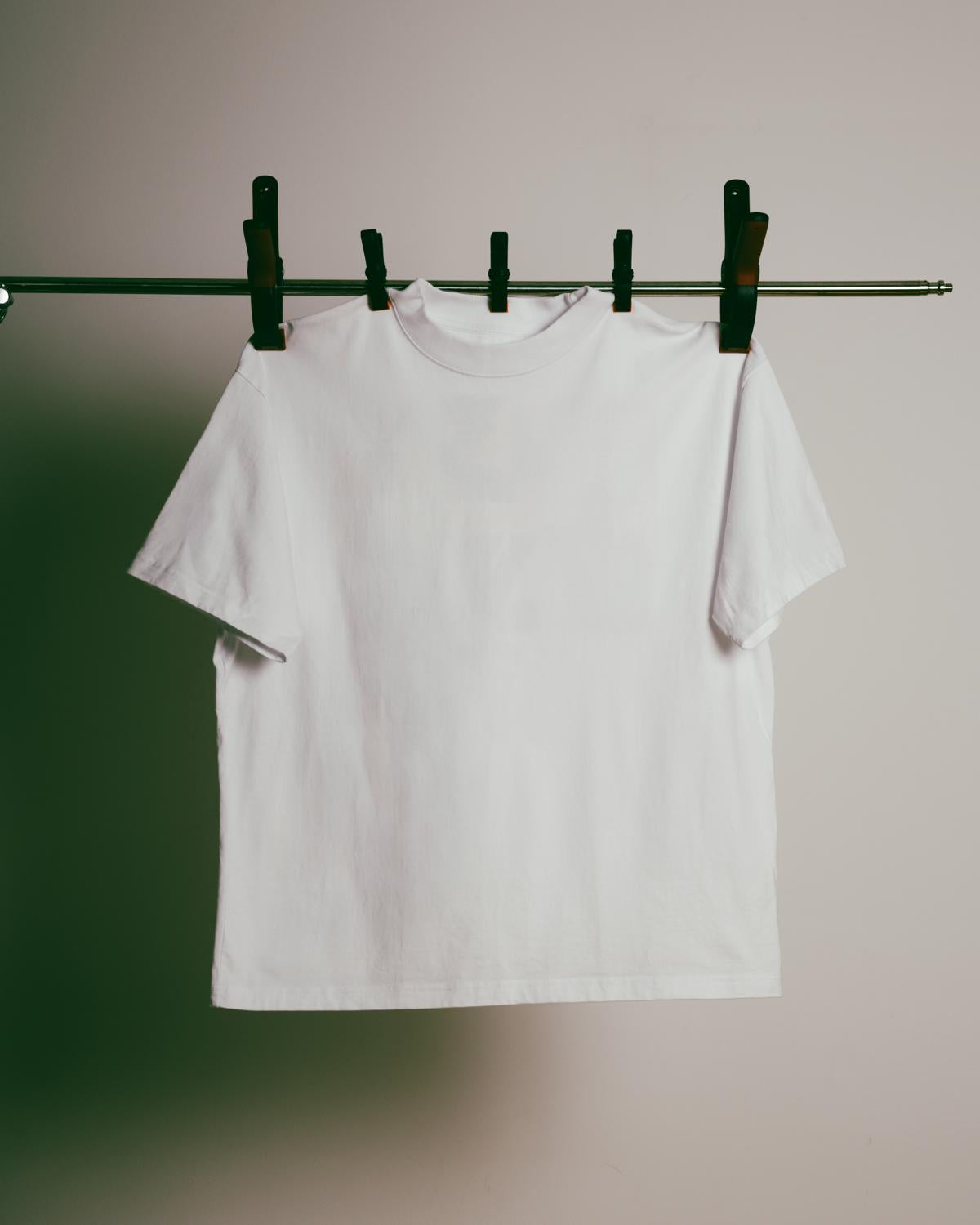the "NO FRONT collage" T-Shirt